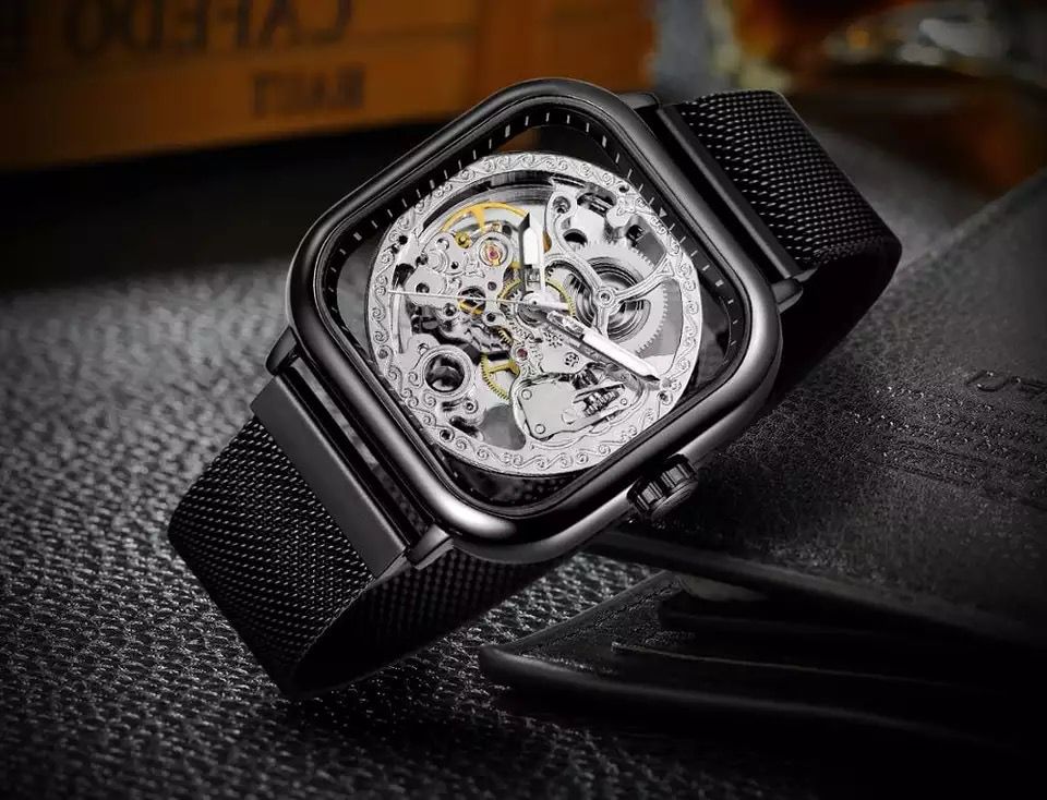 AUTOMATIC FORSINING TRANSPARENT SKELETON  WATCHES .
